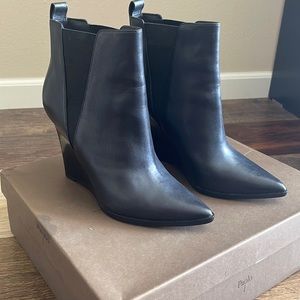 Black leather wedged booties!